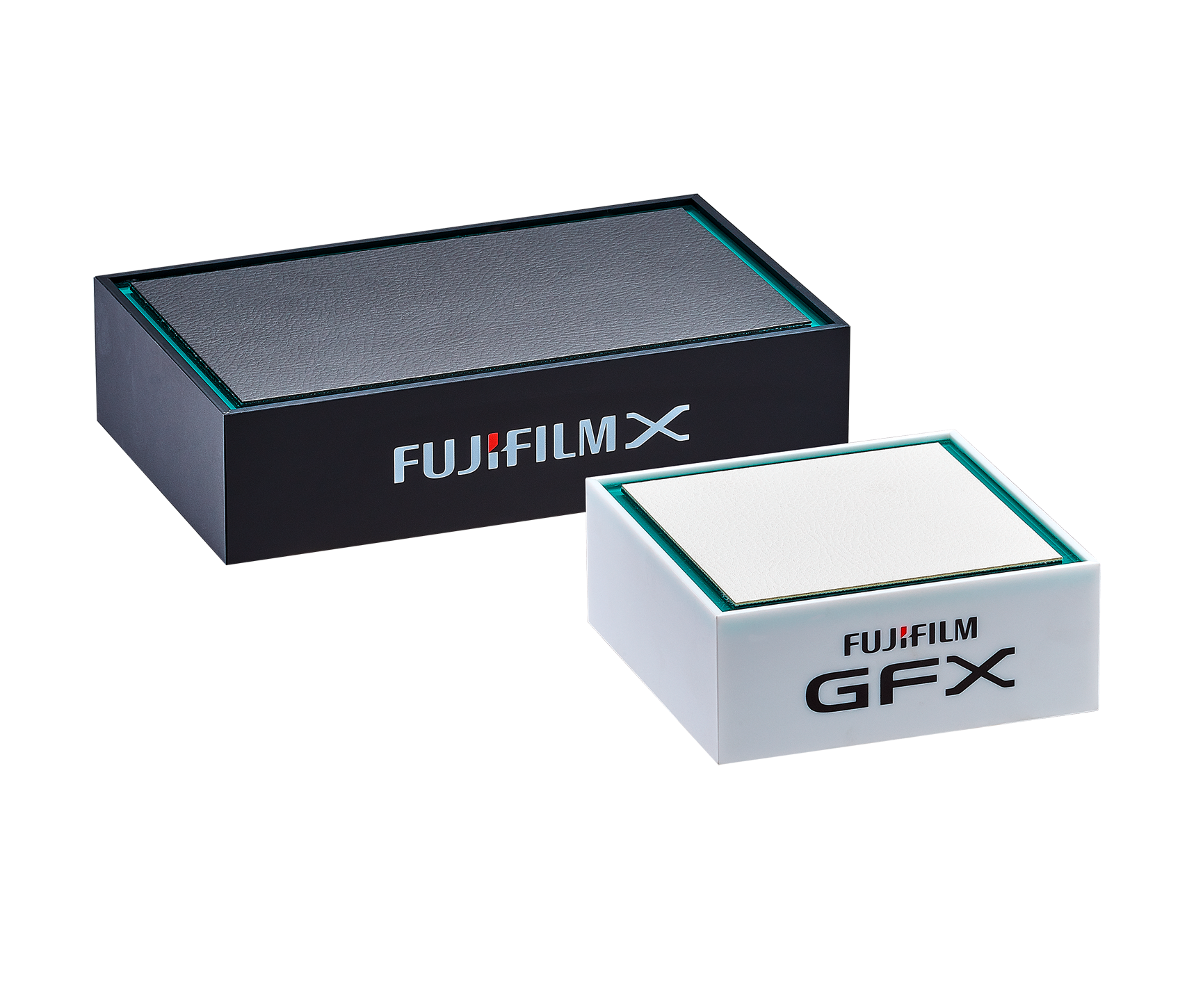 Grundlage ist Acryl in weiß matt und schwarz matt. Oben eine Auflagefläche aus gleichfarbigem Kunstleder.