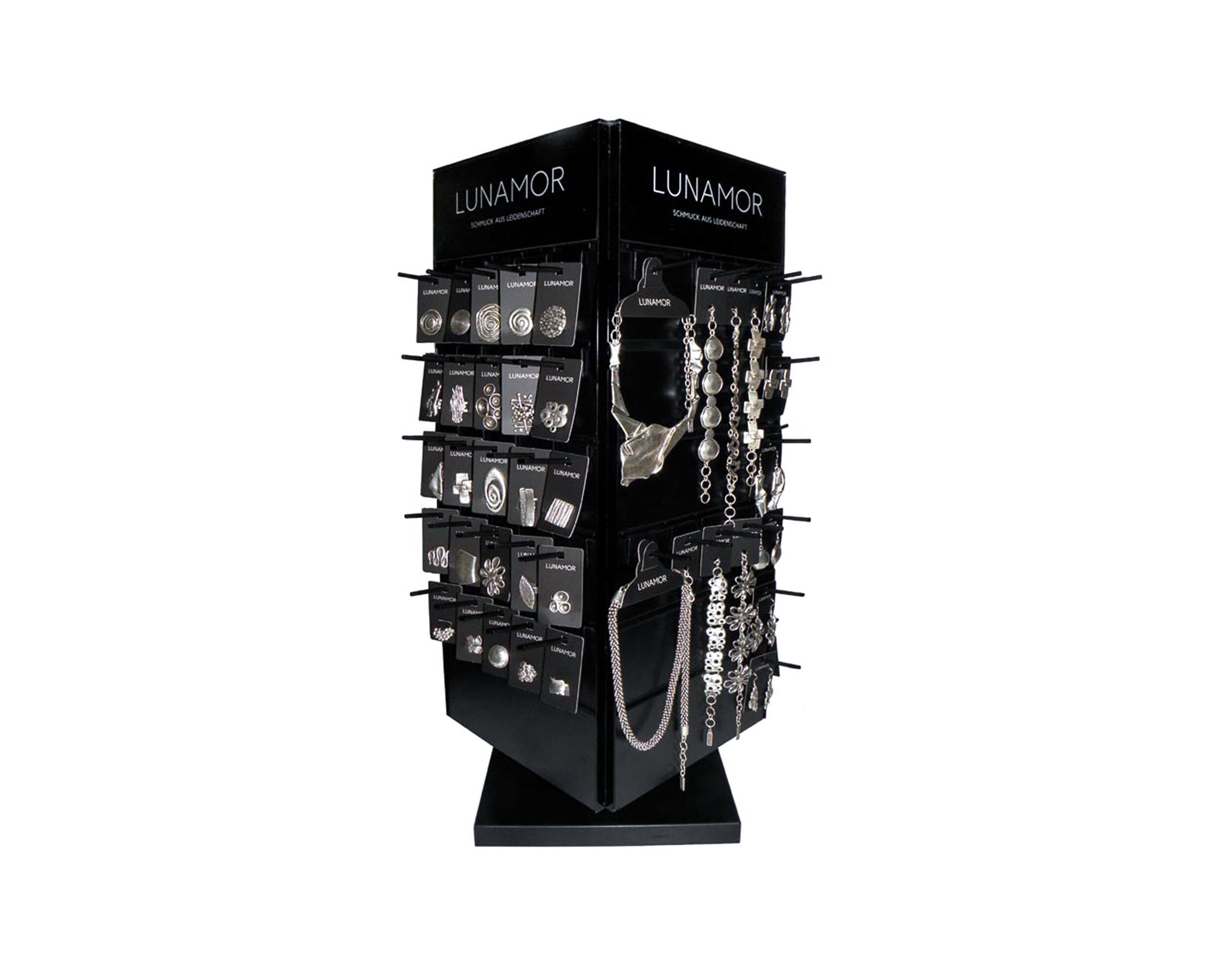 Klassische Umsetzung eines drehbaren Thekendisplays mit variablen Einzelhaken. Materialkombination aus Holz, Kunststoff und Aluminium.